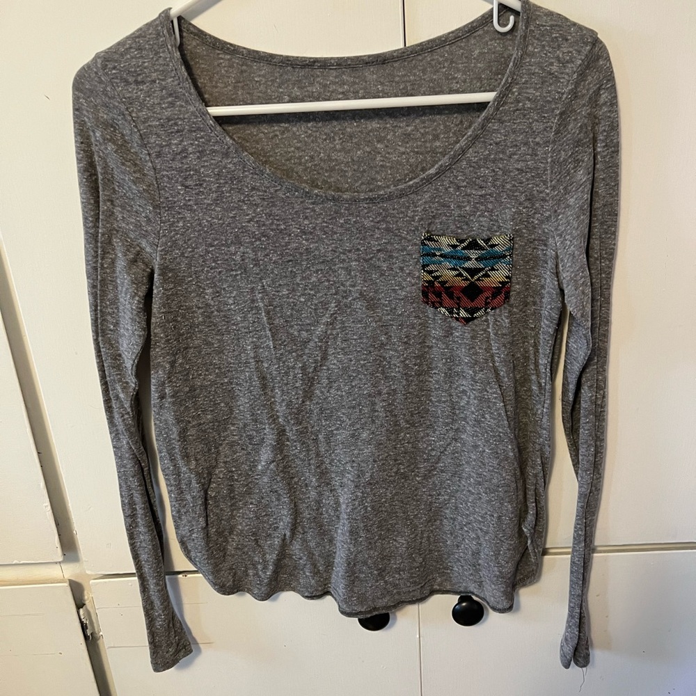 3/4 sleeve tshirt with pocket.